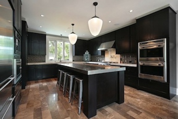 Kitchen With Dark Wood Cabinetry